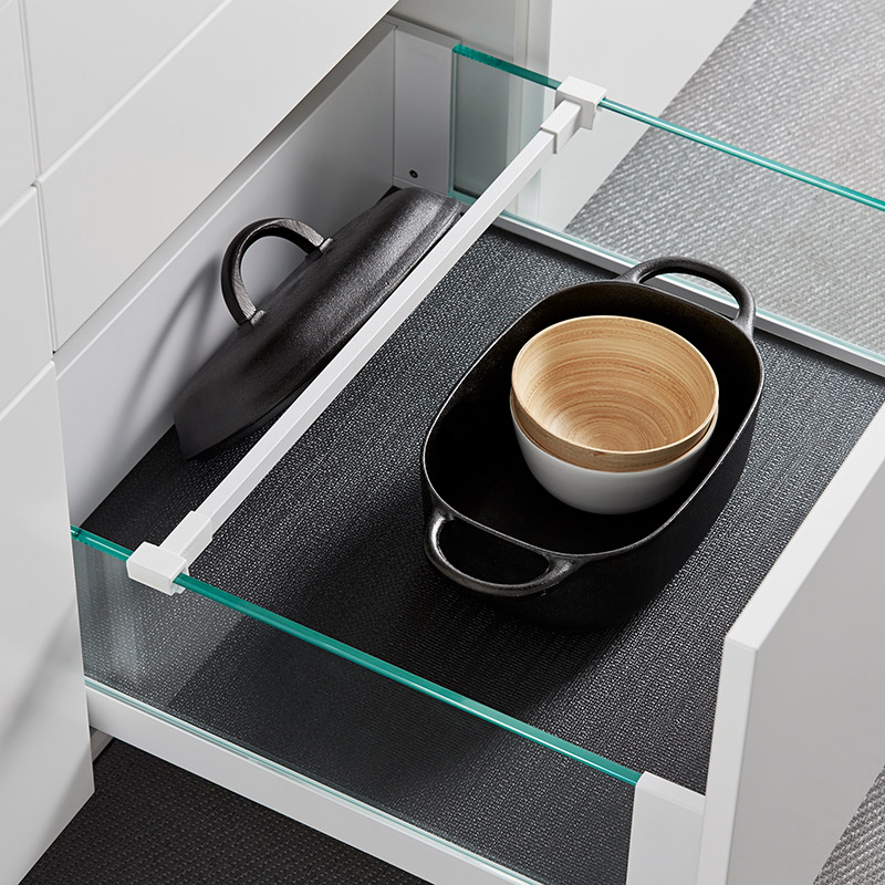 Praktiska funktioner i köket: lådavdelare för lock